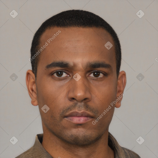 Neutral latino young-adult male with short  black hair and brown eyes