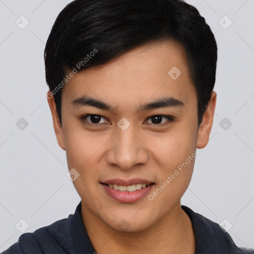 Joyful asian young-adult male with short  black hair and brown eyes