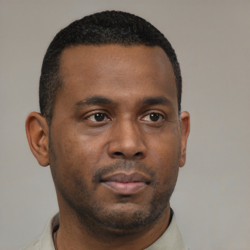 Neutral black young-adult male with short  black hair and brown eyes