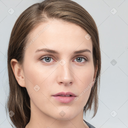 Neutral white young-adult female with medium  brown hair and grey eyes