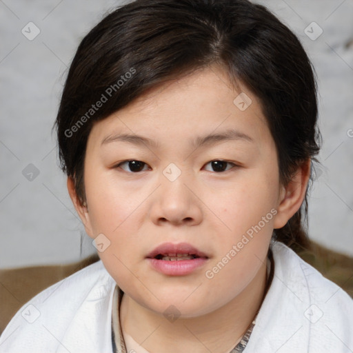 Joyful white child female with medium  brown hair and brown eyes