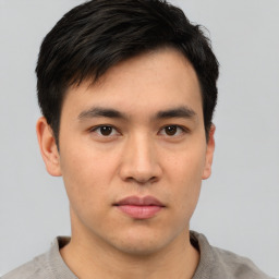 Neutral asian young-adult male with short  black hair and brown eyes