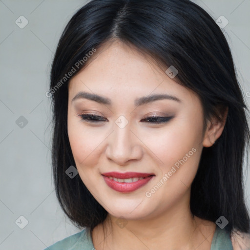 Joyful asian young-adult female with medium  brown hair and brown eyes