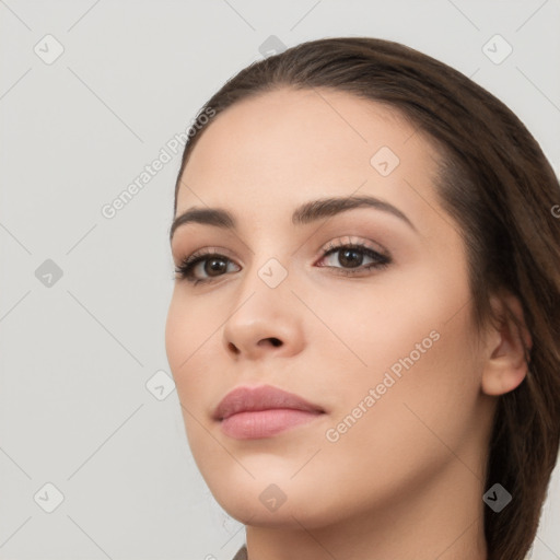 Neutral white young-adult female with long  brown hair and brown eyes