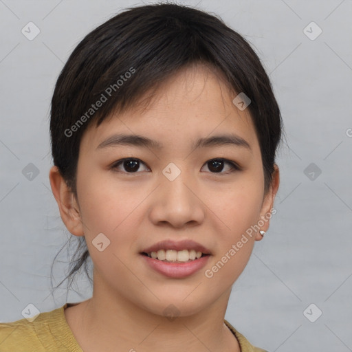 Joyful asian young-adult female with short  brown hair and brown eyes