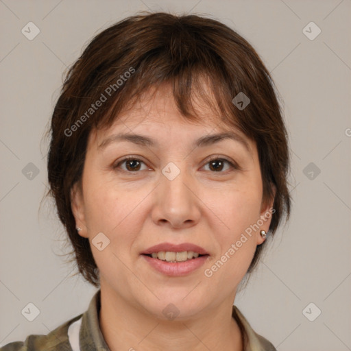 Joyful white adult female with medium  brown hair and brown eyes