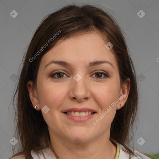 Joyful white young-adult female with medium  brown hair and brown eyes