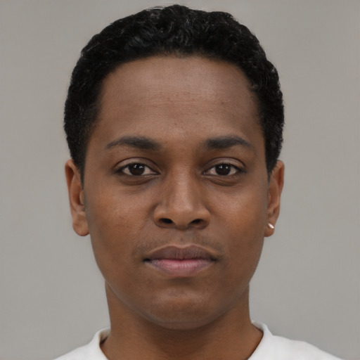 Neutral black young-adult male with short  black hair and brown eyes