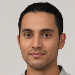Neutral latino young-adult male with short  black hair and brown eyes