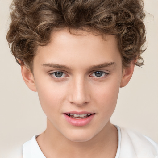 Joyful white child male with short  brown hair and brown eyes