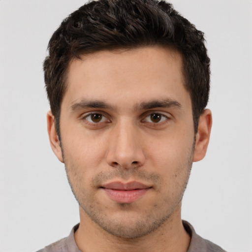 Neutral white young-adult male with short  brown hair and brown eyes