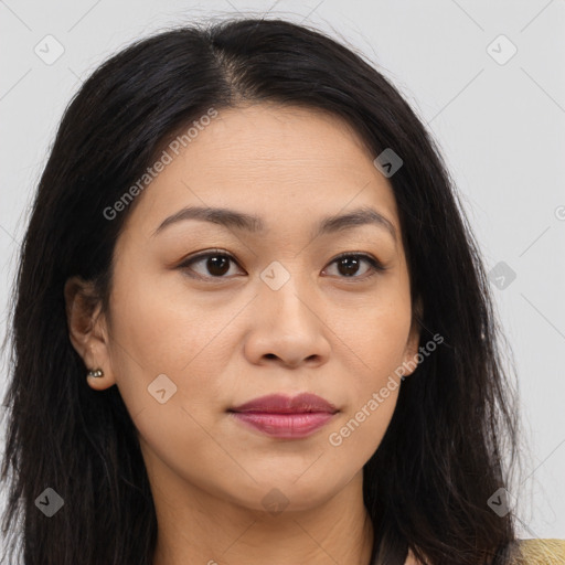 Joyful asian young-adult female with long  brown hair and brown eyes