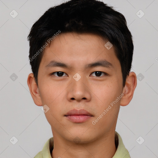 Neutral asian young-adult male with short  brown hair and brown eyes