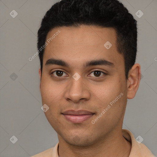 Joyful latino young-adult male with short  black hair and brown eyes