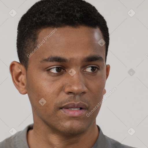 Neutral black young-adult male with short  brown hair and brown eyes