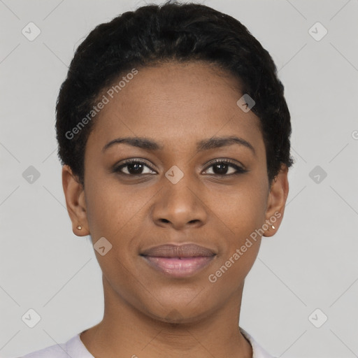 Joyful black young-adult female with short  black hair and brown eyes