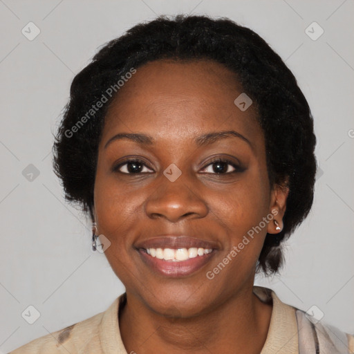 Joyful black young-adult female with medium  black hair and brown eyes