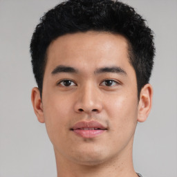 Neutral asian young-adult male with short  black hair and brown eyes