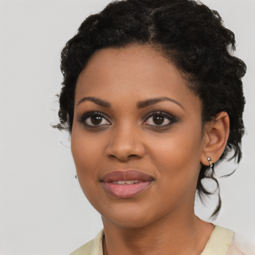 Joyful latino young-adult female with medium  black hair and brown eyes