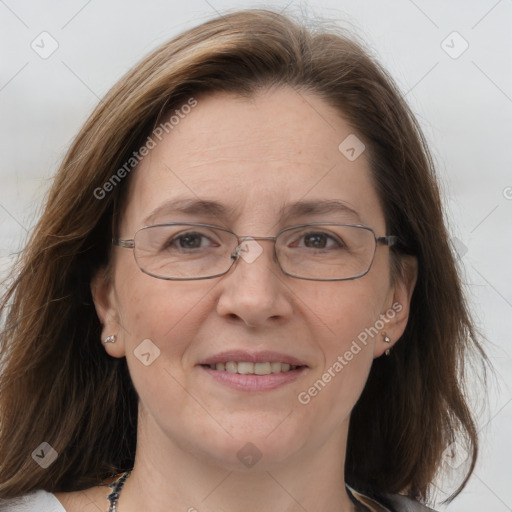 Joyful white adult female with medium  brown hair and grey eyes