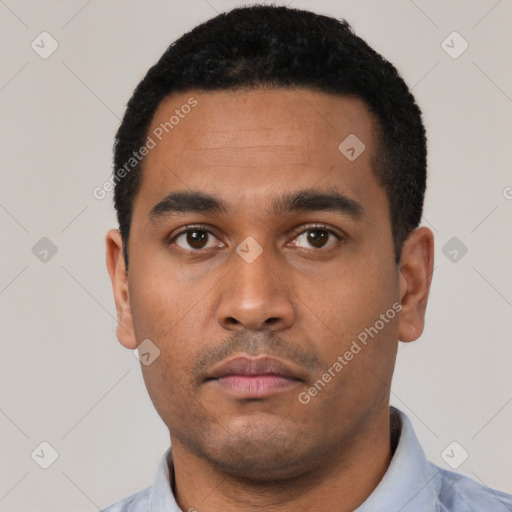 Neutral latino young-adult male with short  black hair and brown eyes