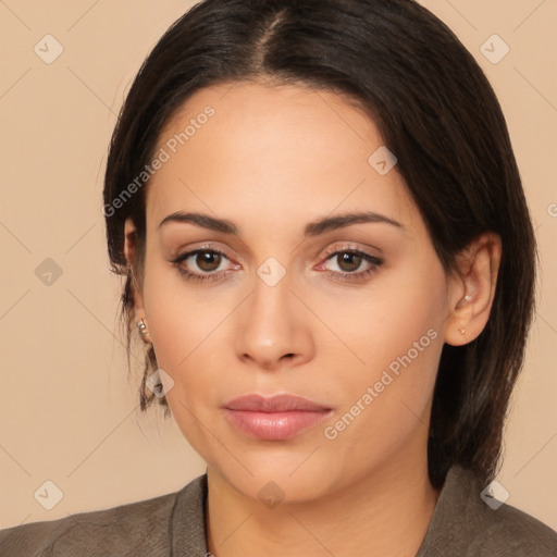 Neutral latino young-adult female with medium  brown hair and brown eyes