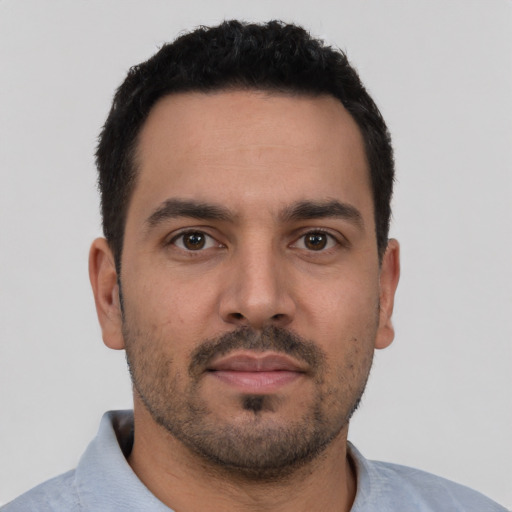 Neutral white young-adult male with short  black hair and brown eyes