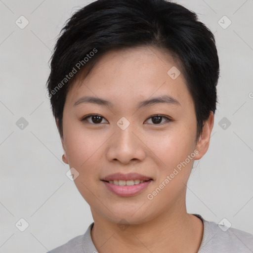 Joyful asian young-adult female with short  brown hair and brown eyes