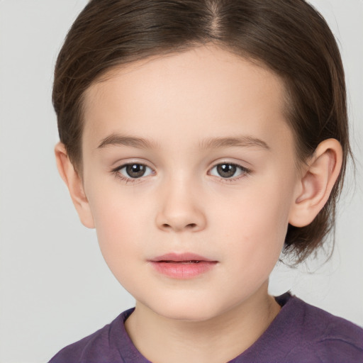 Neutral white child female with medium  brown hair and brown eyes