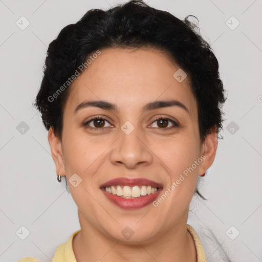 Joyful latino young-adult female with short  brown hair and brown eyes