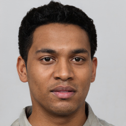Neutral black young-adult male with short  black hair and brown eyes