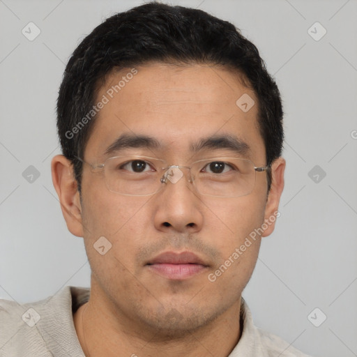 Neutral asian young-adult male with short  brown hair and brown eyes