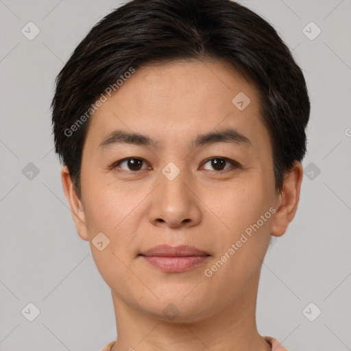 Joyful asian young-adult male with short  brown hair and brown eyes