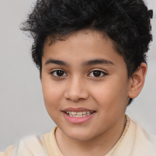 Joyful latino child female with short  brown hair and brown eyes