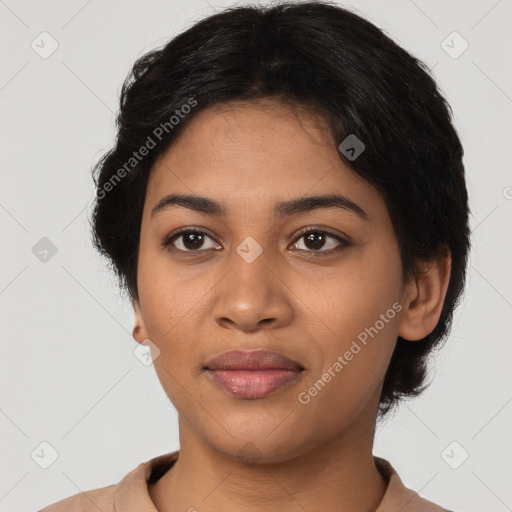 Joyful latino young-adult female with short  black hair and brown eyes