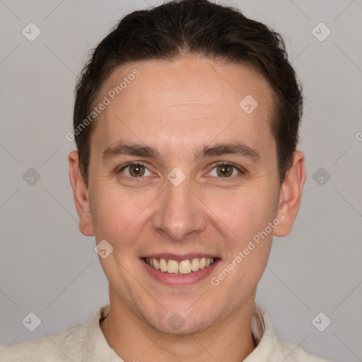 Joyful white adult male with short  brown hair and brown eyes