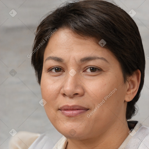 Joyful white adult female with medium  brown hair and brown eyes