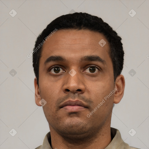 Neutral latino young-adult male with short  black hair and brown eyes