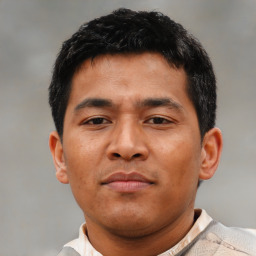 Neutral asian young-adult male with short  brown hair and brown eyes