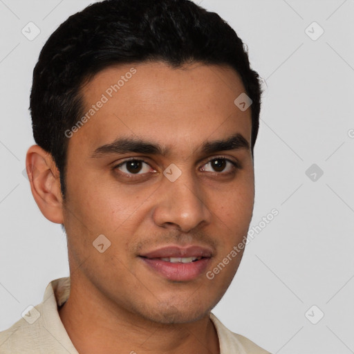 Joyful latino young-adult male with short  brown hair and brown eyes