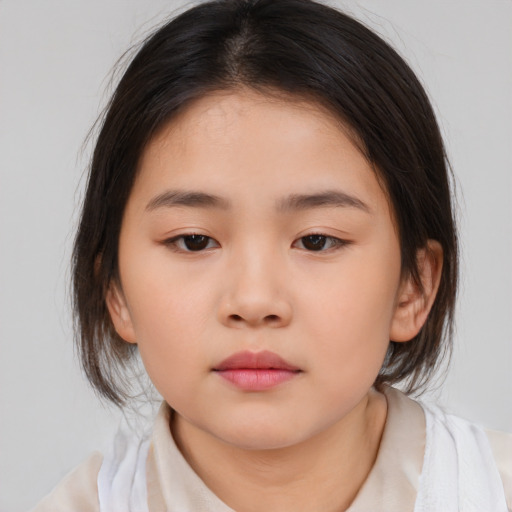 Neutral asian child female with medium  brown hair and brown eyes
