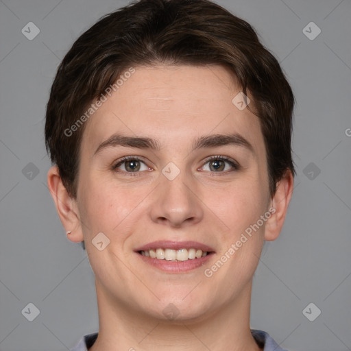 Joyful white young-adult female with short  brown hair and grey eyes