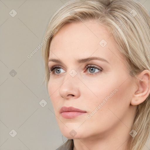 Neutral white young-adult female with medium  brown hair and grey eyes