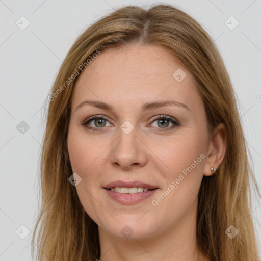 Joyful white adult female with long  brown hair and grey eyes