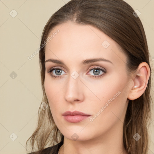 Neutral white young-adult female with long  brown hair and brown eyes