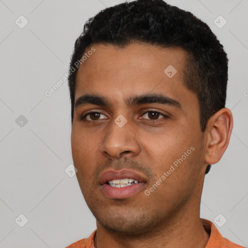 Neutral latino young-adult male with short  black hair and brown eyes