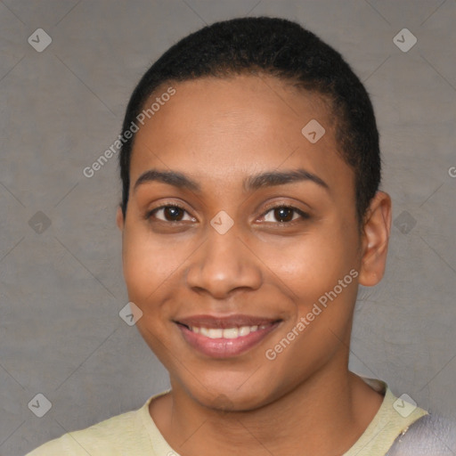 Joyful black young-adult female with short  black hair and brown eyes