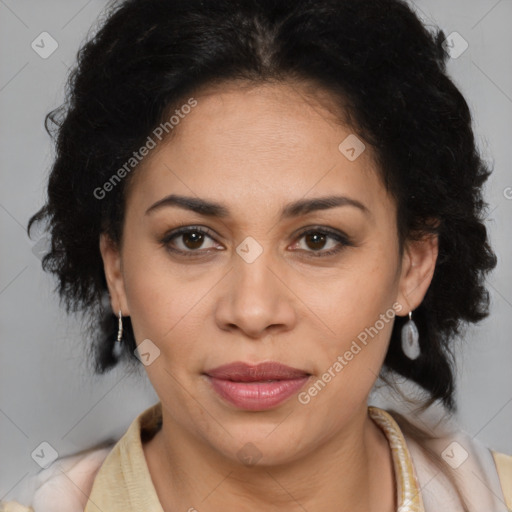 Joyful latino adult female with medium  brown hair and brown eyes