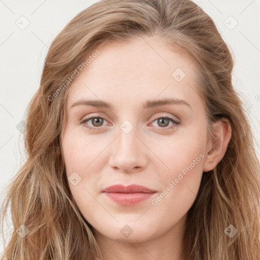 Joyful white young-adult female with long  brown hair and blue eyes