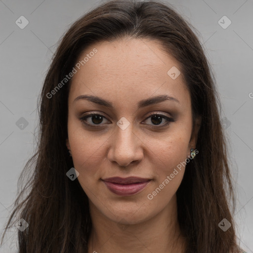 Joyful white young-adult female with long  brown hair and brown eyes